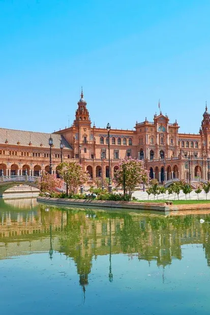 Plaza de España in Seville with canal, bridge and historic buildings